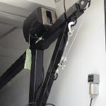 Hoist for stacking and unstacking A/C Units